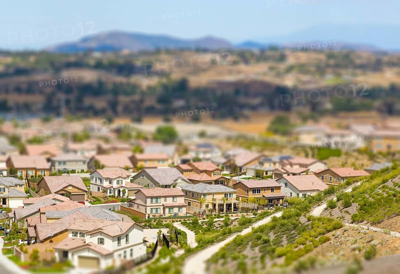Aerial view of populated neigborhood of houses with tilt-shift blur