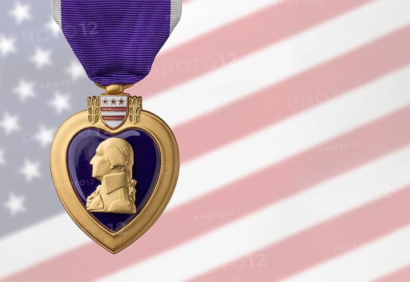 Purple heart miltary merit medal against ghosted american flag