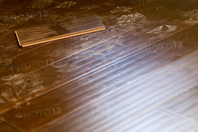 Newly installed dusty brown laminate flooring abstract