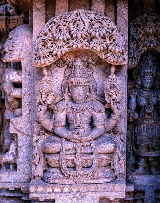 Close up of stone sculpture of dancing Lakshmi in Hoysala architecture at Somnathpur