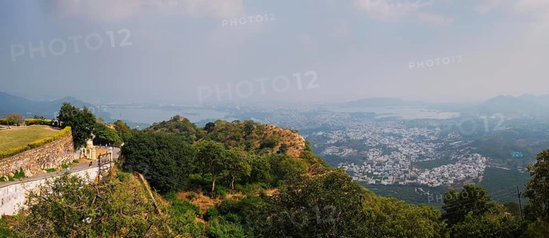 Aerial panorama of Udaipur with Lake Pichola and hills scenery