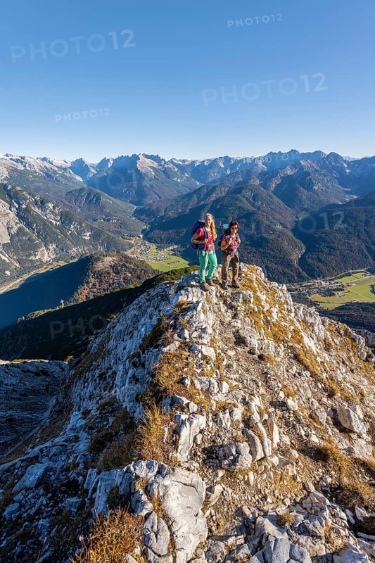 Two female hikers on a summit