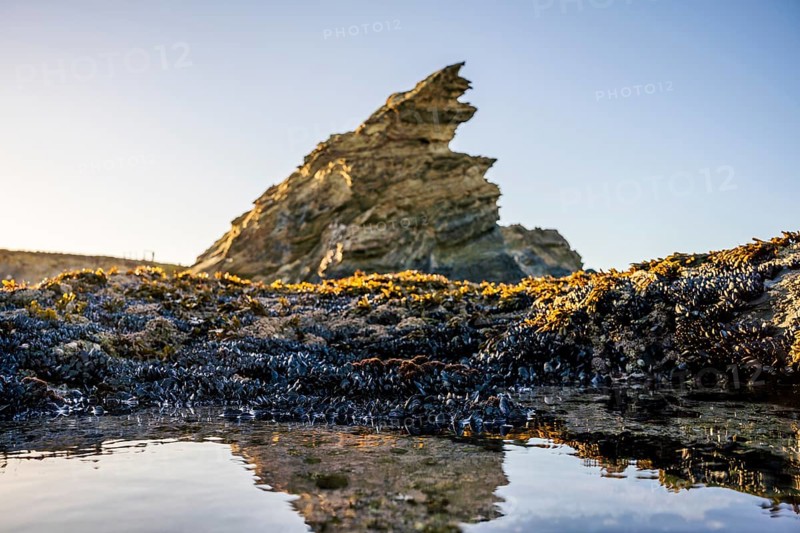 Beautiful landscape and seascape with rock formation in Samoqueira Beach