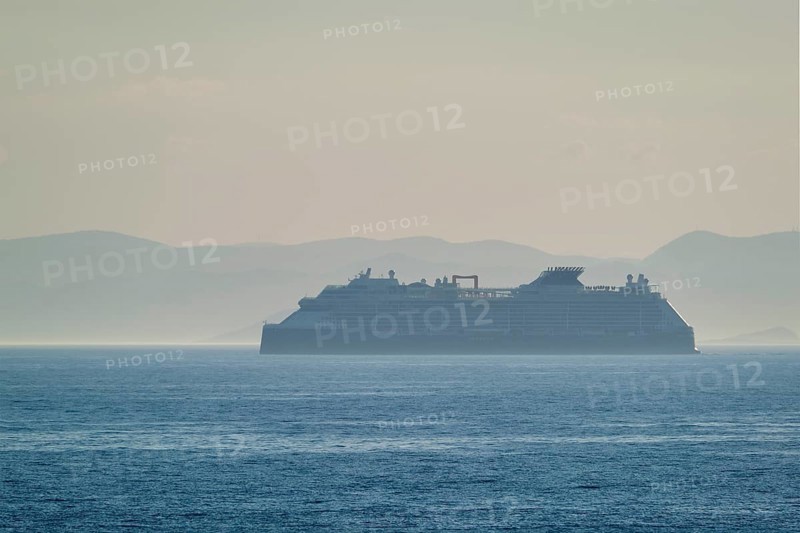 Cruise liner ship silhouette in Mediterranea sea. Aegean sea