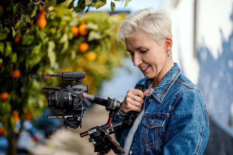 Camera operator with movie setup including a gimbal