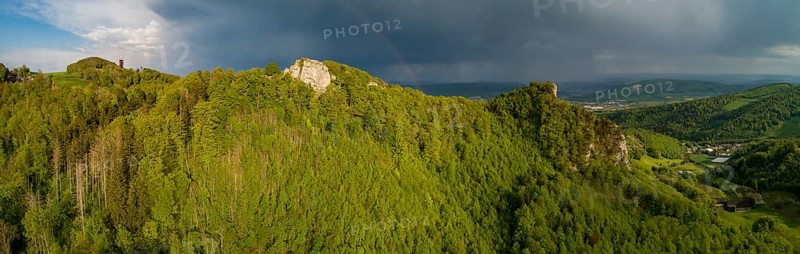 Passing thunderstorm with rainbow