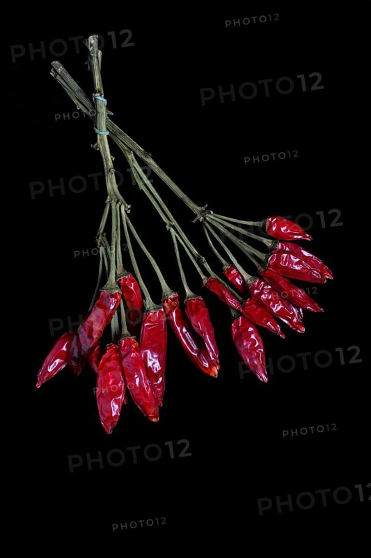 Dried chilli peppers on sweet pepper