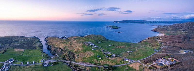 Panorama over Geodha Smoo and Smoo Cave Cliffs from a drone