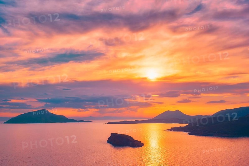 Aegean Sea with Greek islands view on sunset