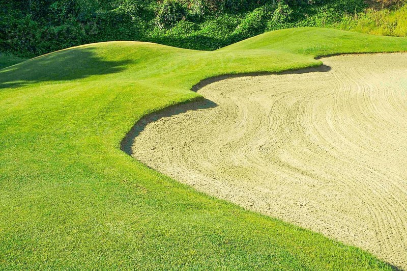 Abstract of golf course and sand bunker
