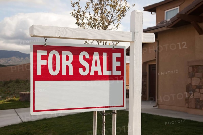 For sale real estate sign in front of house ready for your own copy