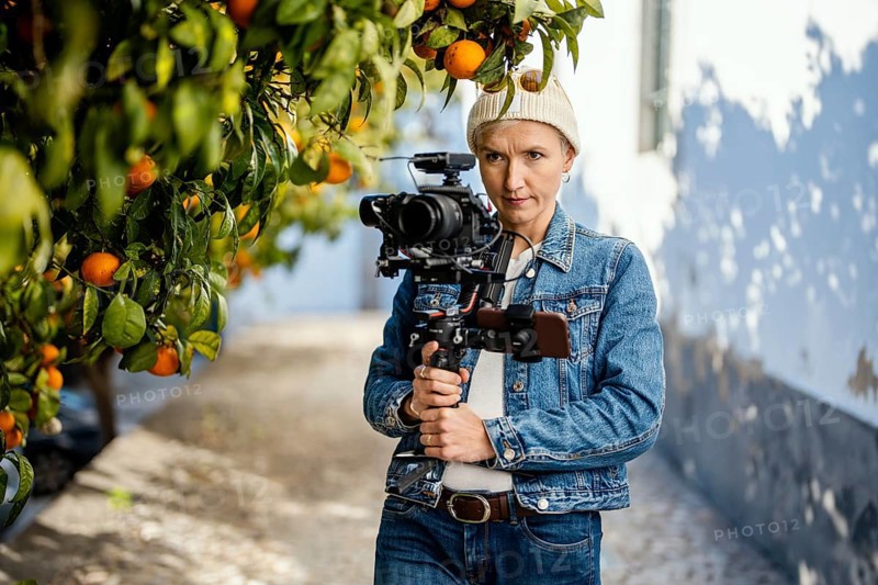 Camera operator with movie setup including a gimbal