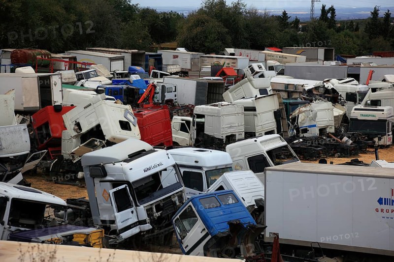 Car cemetery with truck
