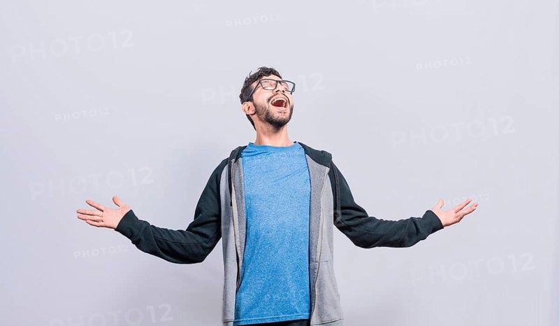 Desperate and angry person shouting with open arms