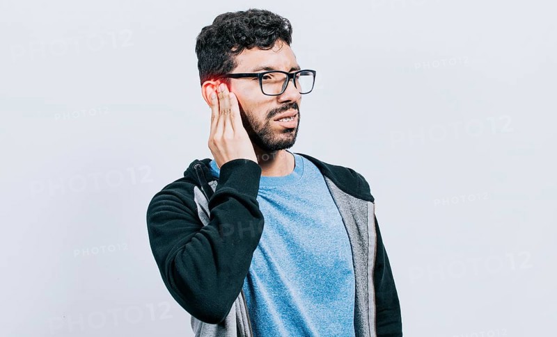 Person with ear pain