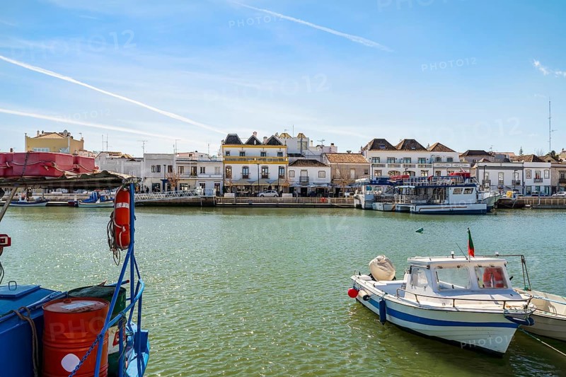 Beautiful cityscape of historic Tavira by Gilao river