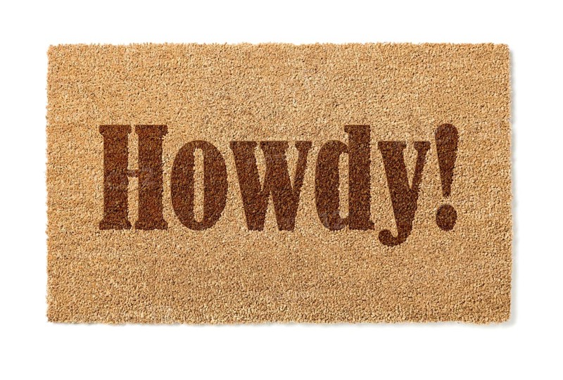 Howdy welcome mat isolated on A white background