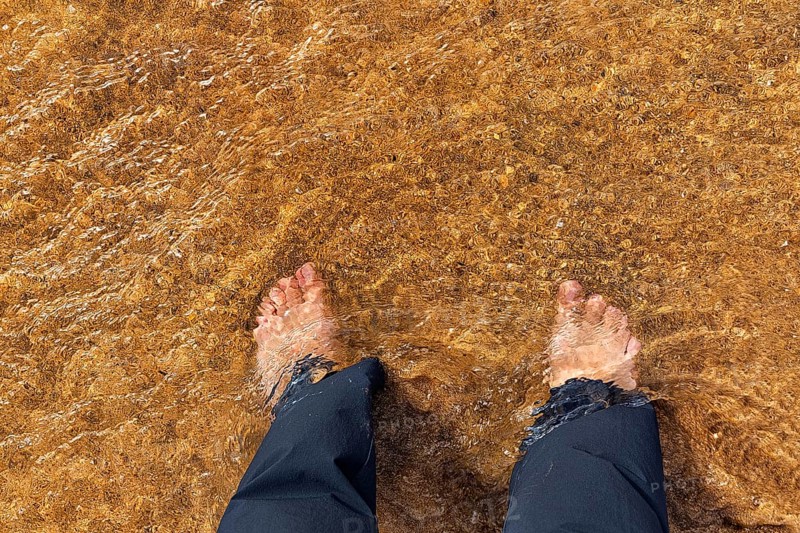 Two feet in clear water