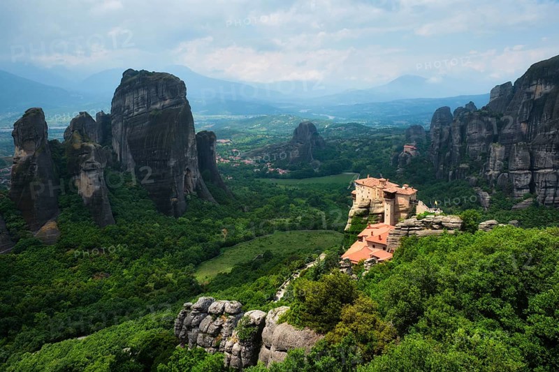 Sunset over monastery of Rousanou and Monastery of St
