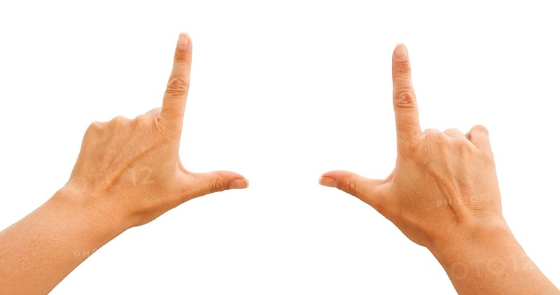 Female hands making frame isolated on a white background with clipping paths for your own positioning