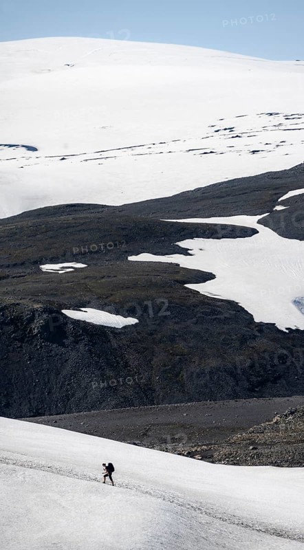 Hiker on snow field