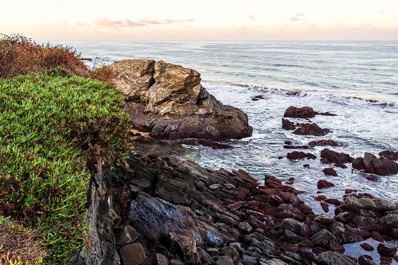 Beautiful landscape and seascape with rock formation in Samoqueira Beach