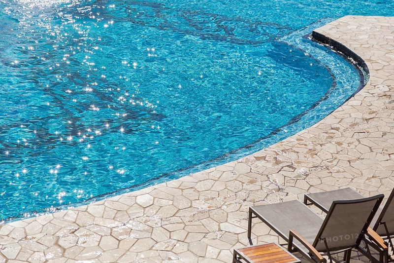 Exotic luxury swimming pool water and architecture abstract