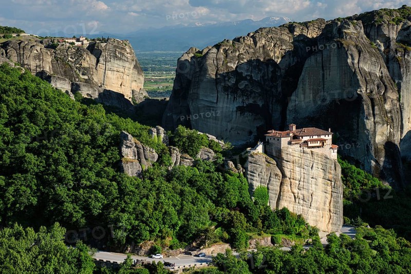Monastery of Rousanou and Monastery of St. Stephen in famous greek tourist destination Meteora in Greece on sunset with scenic landscape