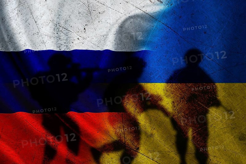 Russia vs Ukraine flag on cracked wall