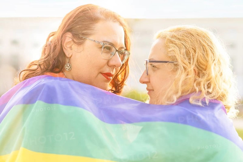 Lesbian women couple in love embracing each other