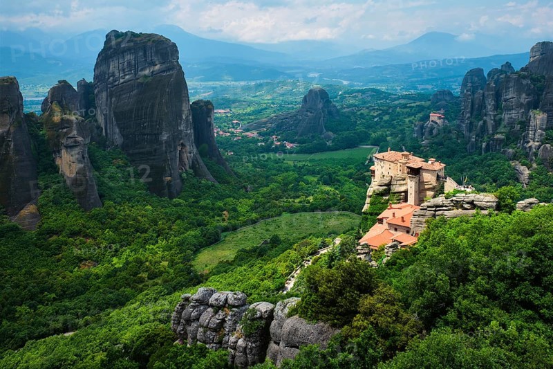 Sunset over monastery of Rousanou and Monastery of St