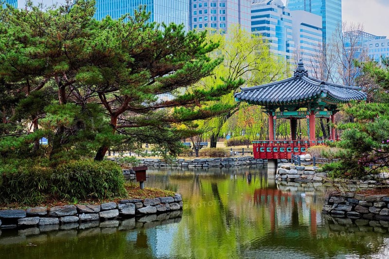 Yeouido Park public park pond with pavilion summerhouse in Seoul