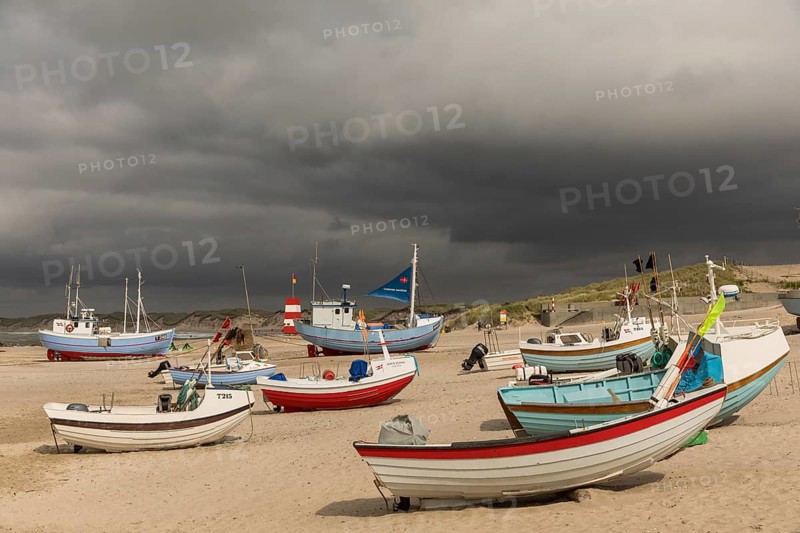 Dark sky over the harbour of Vorupoer