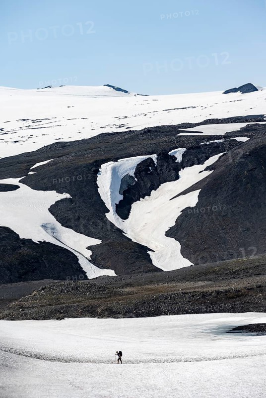 Hiker on snow field