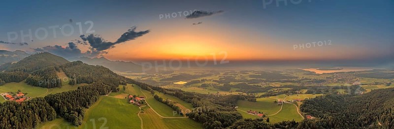 Sunset panorama in the southern foothills of the Alps at Chiemsel
