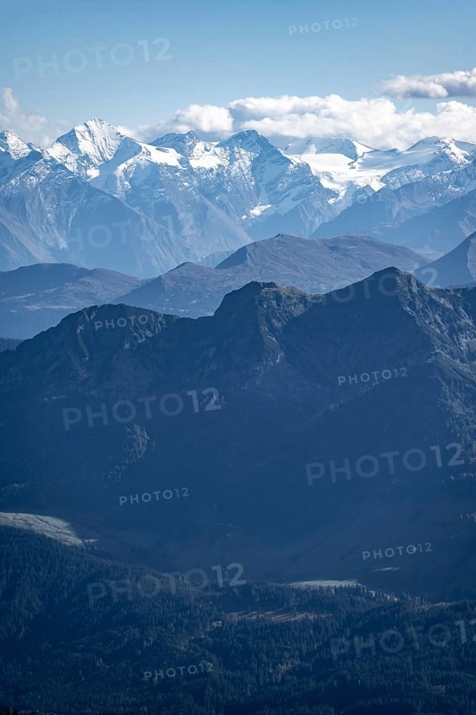 Snow-covered mountain peaks on the main ridge of the Alps