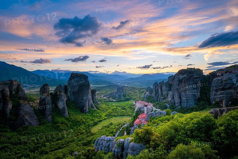 Monastery of Rousanou and Monastery of St. Nicholas Anapavsa in famous greek tourist destination Meteora in Greece on sunset