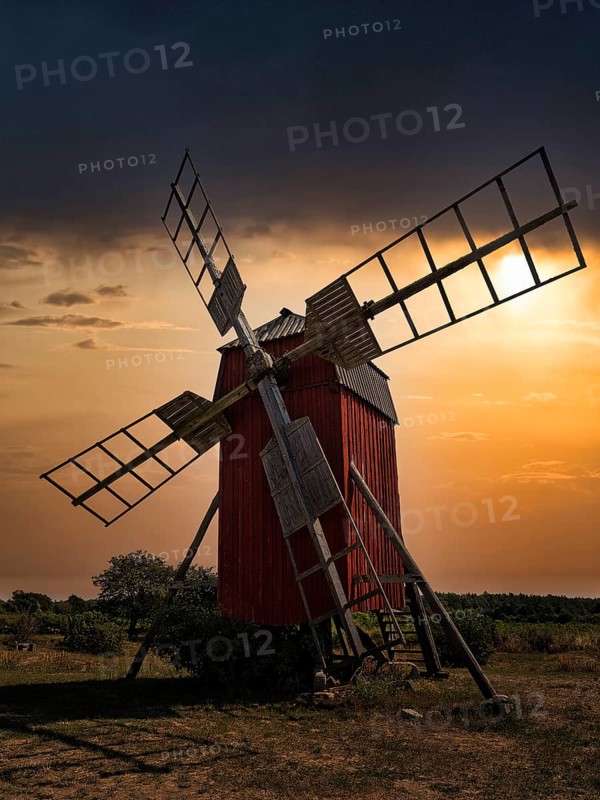 Backlit trestle windmill