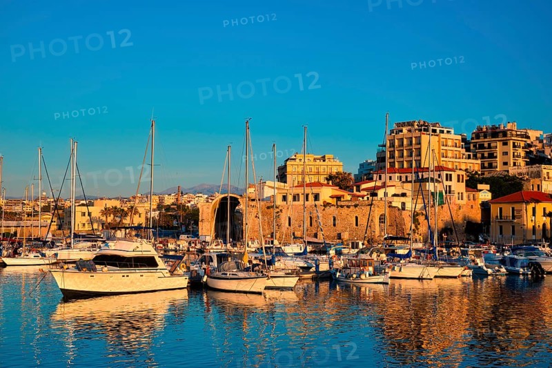 Venetian Fort castle in Heraklion and moored fishing boats