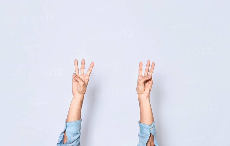 Hands counting three