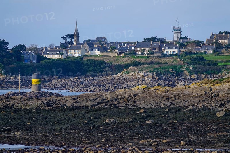 View at low tide from Roscoff to the island Ile de Batz with church