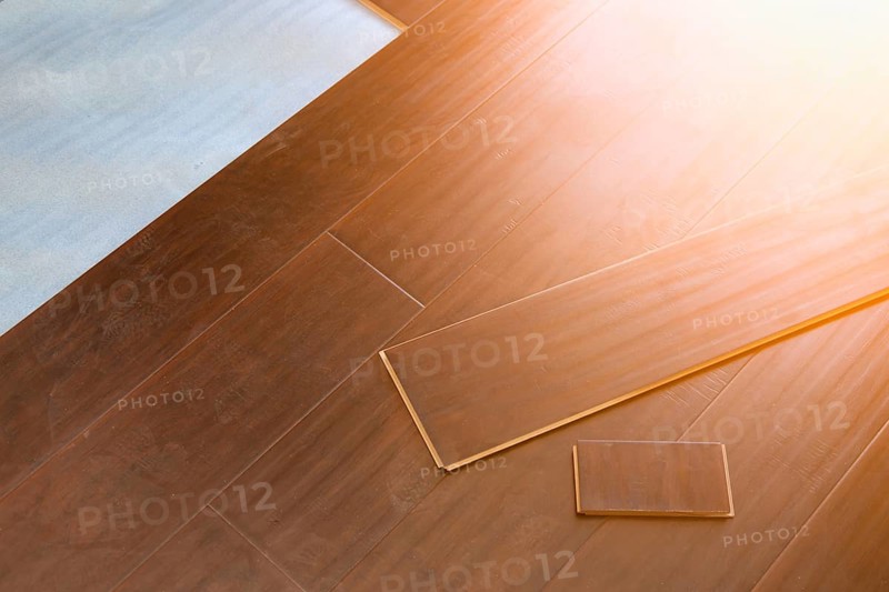 Newly installed brown laminate flooring abstract