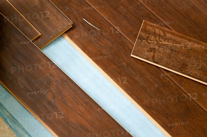 Newly installed brown laminate flooring abstract