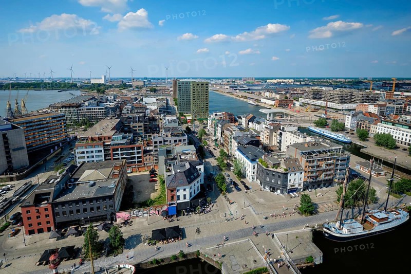 Aerial view of Antwerp city with port crane in cargo terminal. Antwerpen