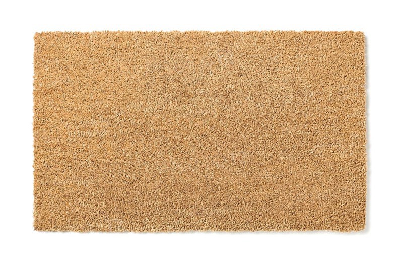 Blank home sweet home welcome mat isolated on a white background ready for your own text
