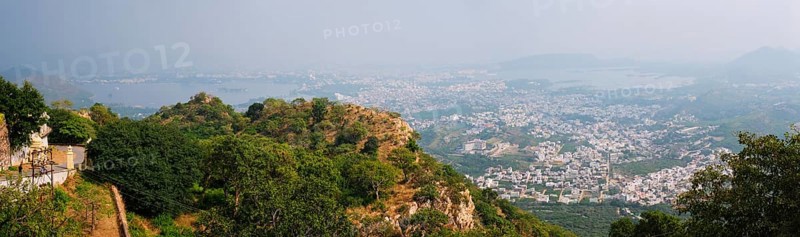 Aerial panorama of Udaipur with Lake Pichola and hills scenery