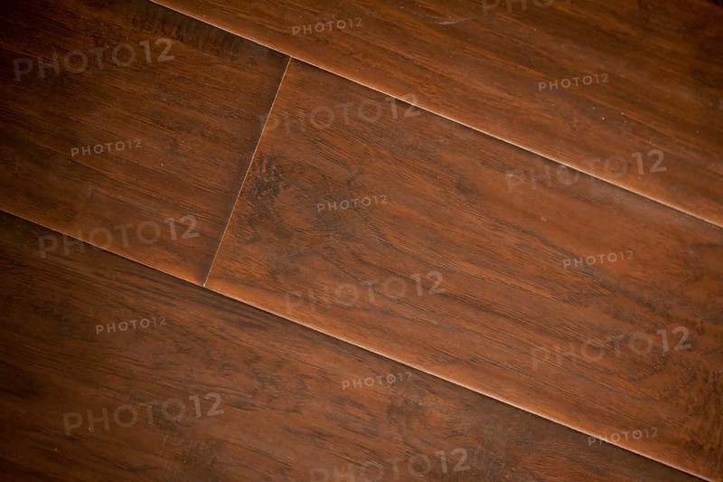 Newly installed brown laminate flooring abstract