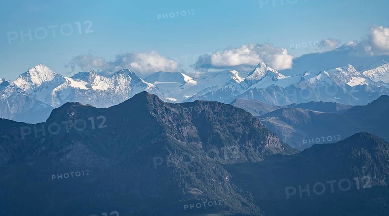 Snow-covered mountain peaks on the main ridge of the Alps