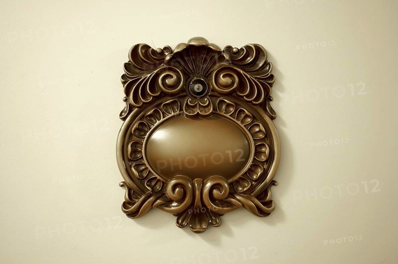 Elegant victorian peep hole on a door