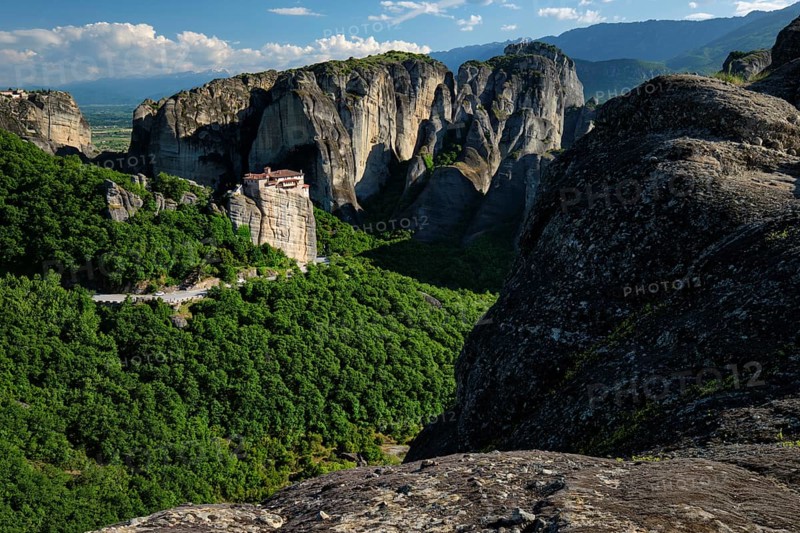 Monastery of Rousanou and Monastery of St. Stephen in famous greek tourist destination Meteora in Greece on sunset with scenic landscape